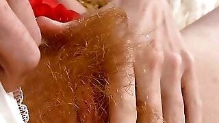 Zia loves being hairy and fingering her pussy 